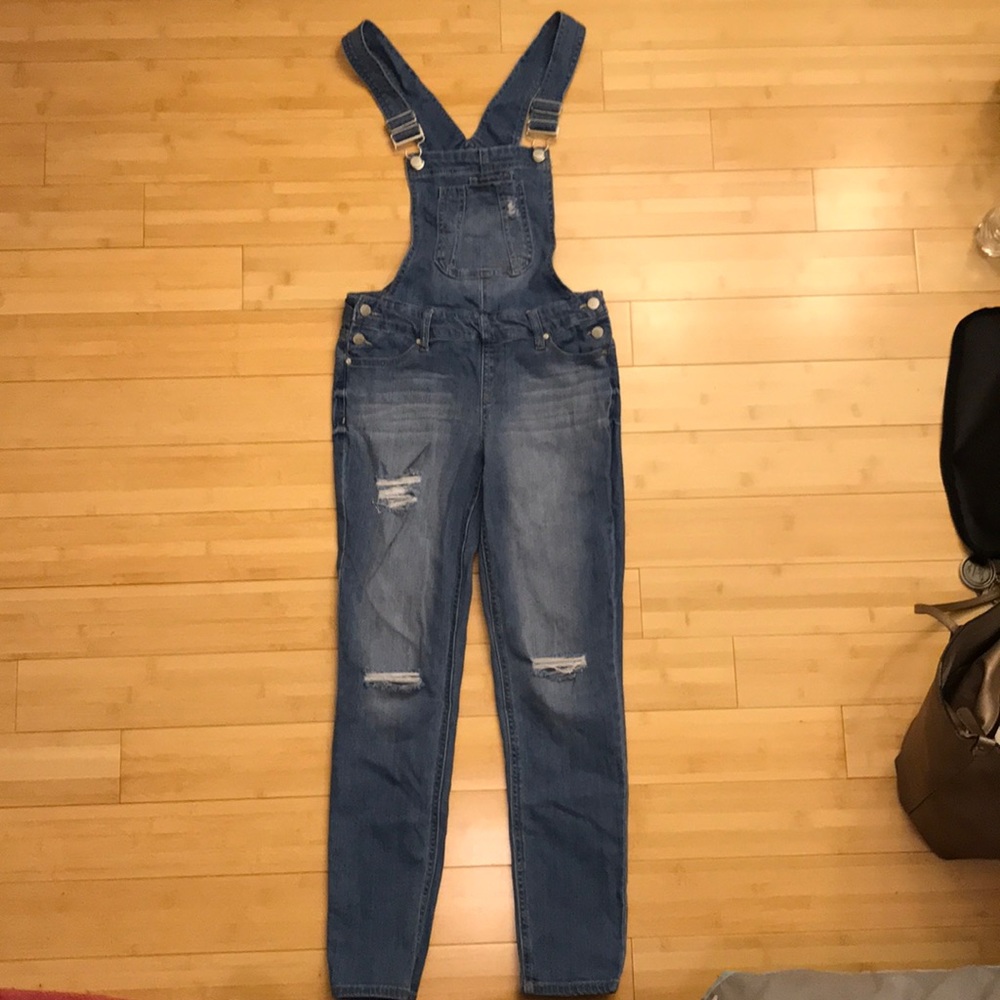 Blue skinny jean overalls